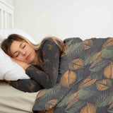 Therapy blanket and bedding set with autumnal leaf pattern.