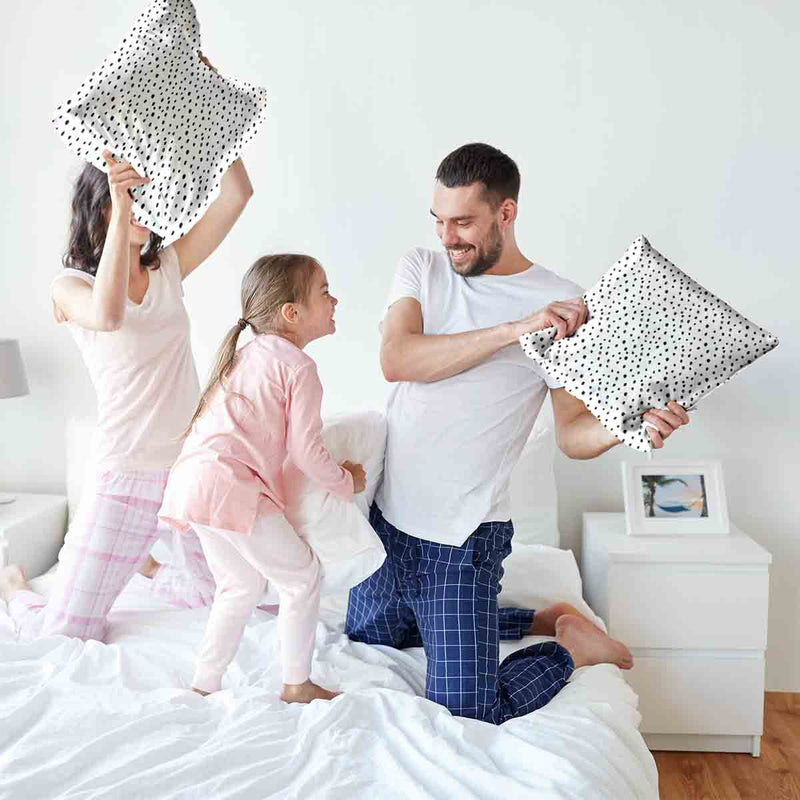 White health pillow with many small dots.