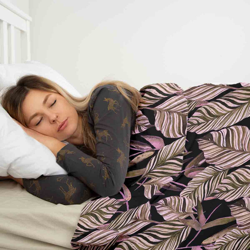 Therapy blanket and bedding set, black with purple leaves.